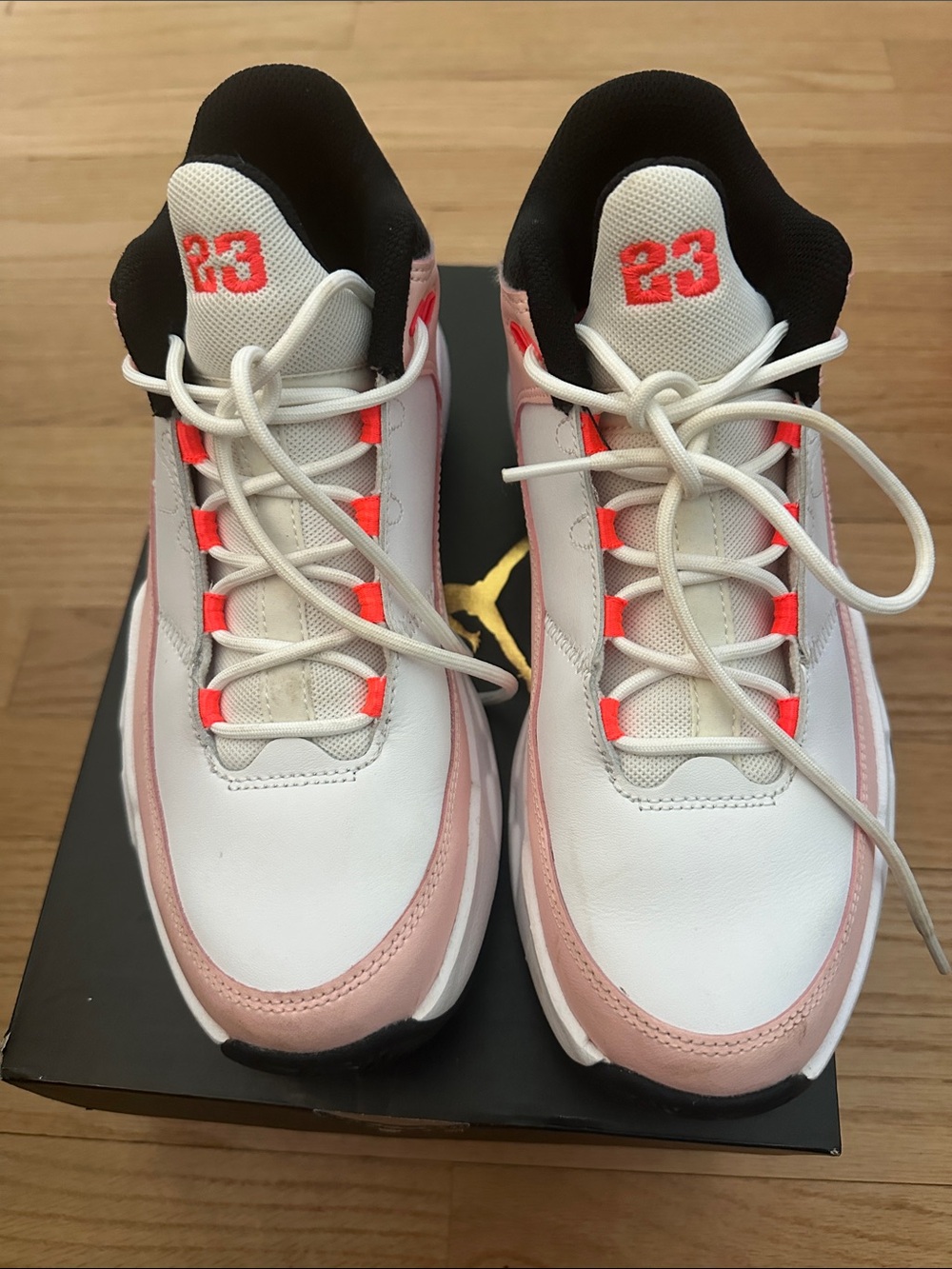 Nike Kids White Pink Black Sneakers with Neon Orange Eyelet Accents